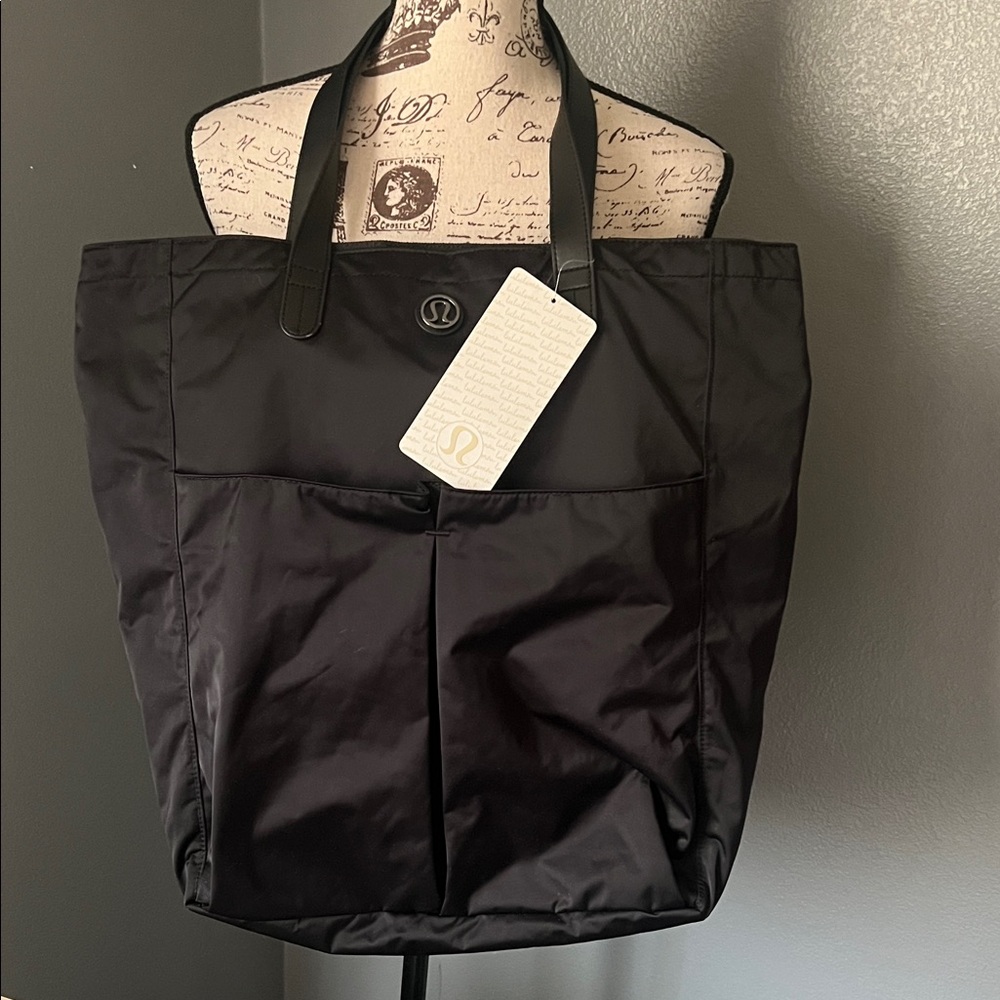 Lululemon Athletica Black large Logo Tote with 2 large outside pockets NWT